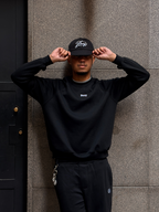 SIX PANEL TRUCKER ATHLETIC BLACK